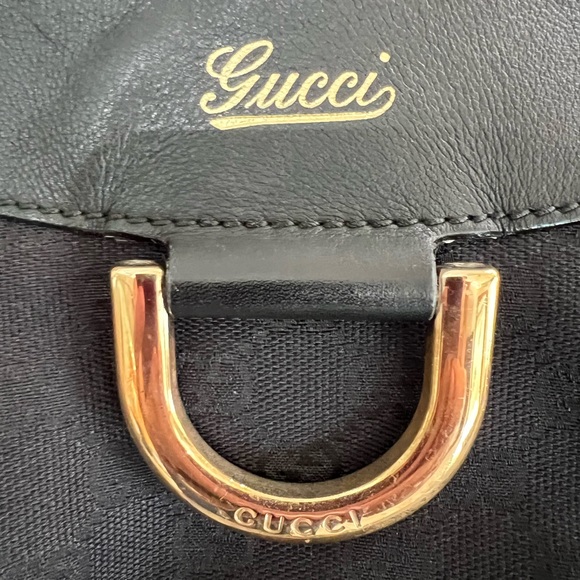 Gucci black canvas monogram hobo bag with gold buckle. Comes with a duster bag. - Picture 6 of 12